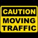 Caution Moving Traffic Sign